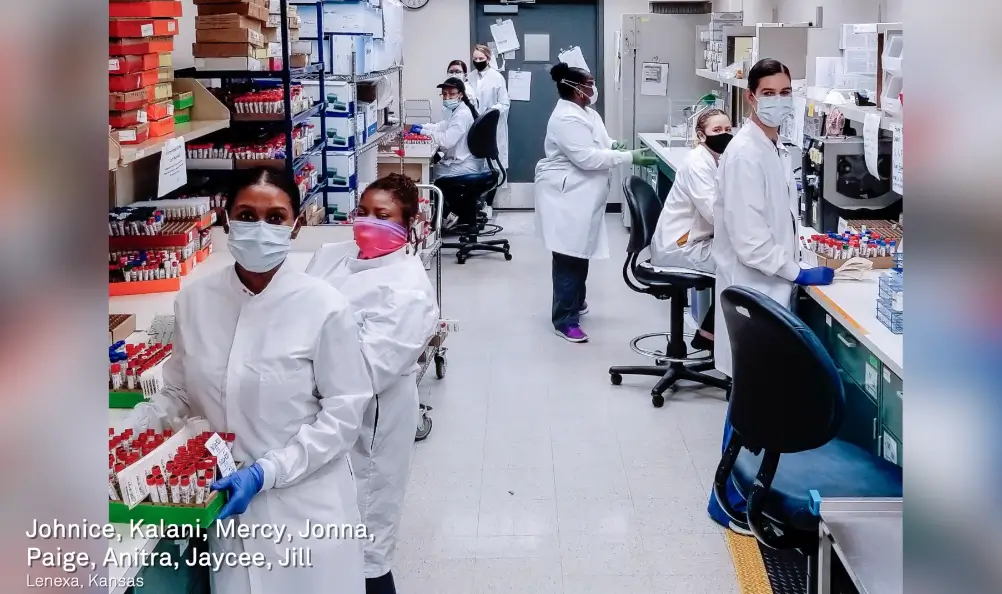 Group of Lab Technichians posing for a picture in a lab